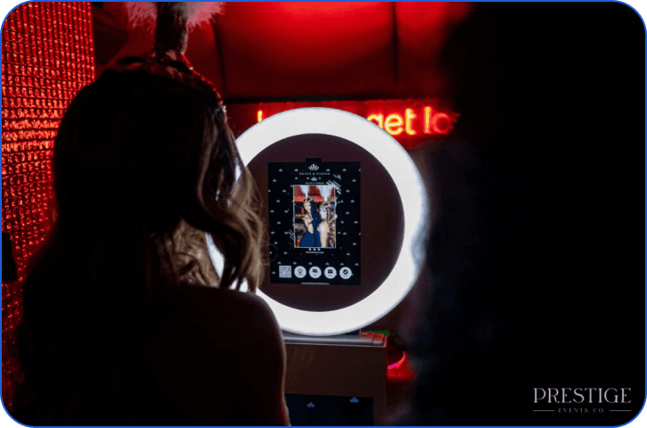 Person interacting with a ring-light video booth